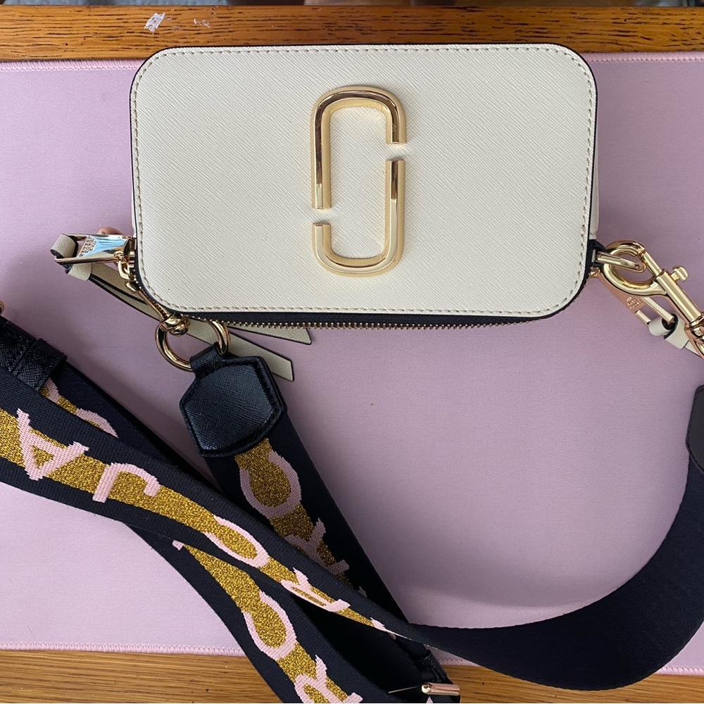 Marc Jacobs gold and black snapshot bag. Authenticity card included
